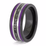 Angled view of black ceramic memorial ring with purple enamel pinstripes and titanium inlay band containing cremation ashes.