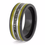 Angled view of black ceramic memorial ring with yellow enamel pinstripes and titanium inlay band containing cremation ashes.