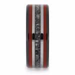 Straight-on view of black ceramic memorial ring with red enamel pinstripes and titanium inlay band containing cremation ashes.