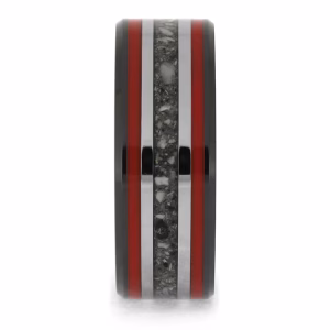 Straight-on view of black ceramic memorial ring with red enamel pinstripes and titanium inlay band containing cremation ashes.