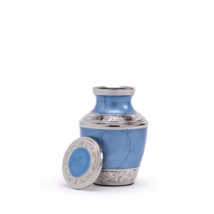Enamel Blue Ripple Keepsake Urn with lid resting beside the urn on a white background