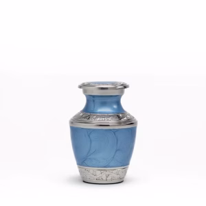 Enamel Blue Ripple Keepsake Urn with lid secured on top against a white background