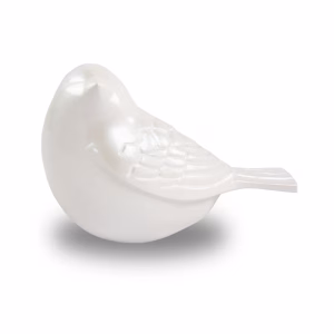 Side view of the Pearl Songbird Keepsake Cremation Urn showing the curved body, wing detail, and tail on a white background