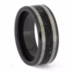 Angled view of black ceramic memorial ring with antler and cremation ash inlay