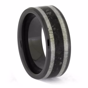 Angled view of black ceramic memorial ring with antler and cremation ash inlay