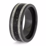 Angled view of black ceramic memorial ring with antler and cremation ash inlay