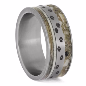 Angled view of paw prints memorial ring with fur, cremation ashes, and antler inlay