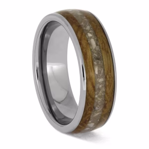 Angled side view of a polished titanium memorial ring featuring a whiskey barrel oak wood inlay with a central channel for holding cremation ashes.