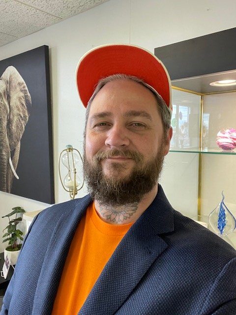 Showroom scene with memorial displays and a welcoming atmosphere for families