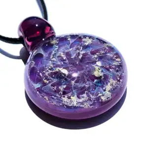Elegant cremation art glass pendant with swirling purple and blue accents.