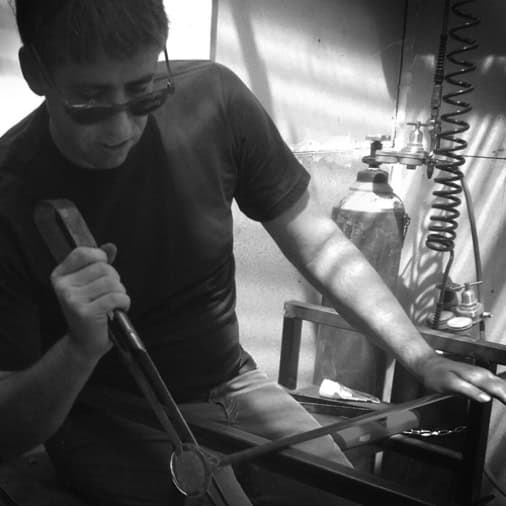 Robert creating handcrafted cremation memorials
