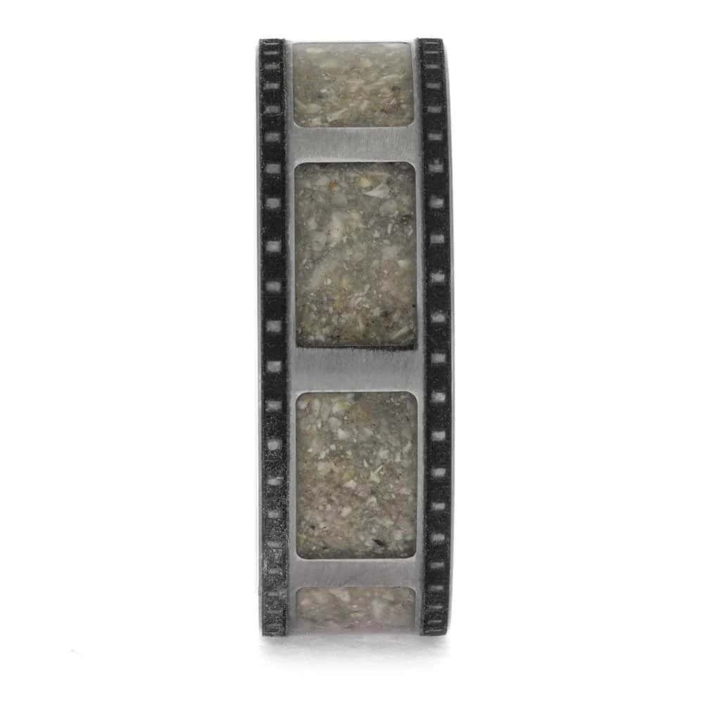 Titanium cremation ring layout with ashes and 35mm film strip design