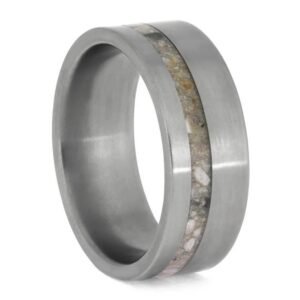 Angled front view of matte titanium cremation ring with offset cremation ash inlay