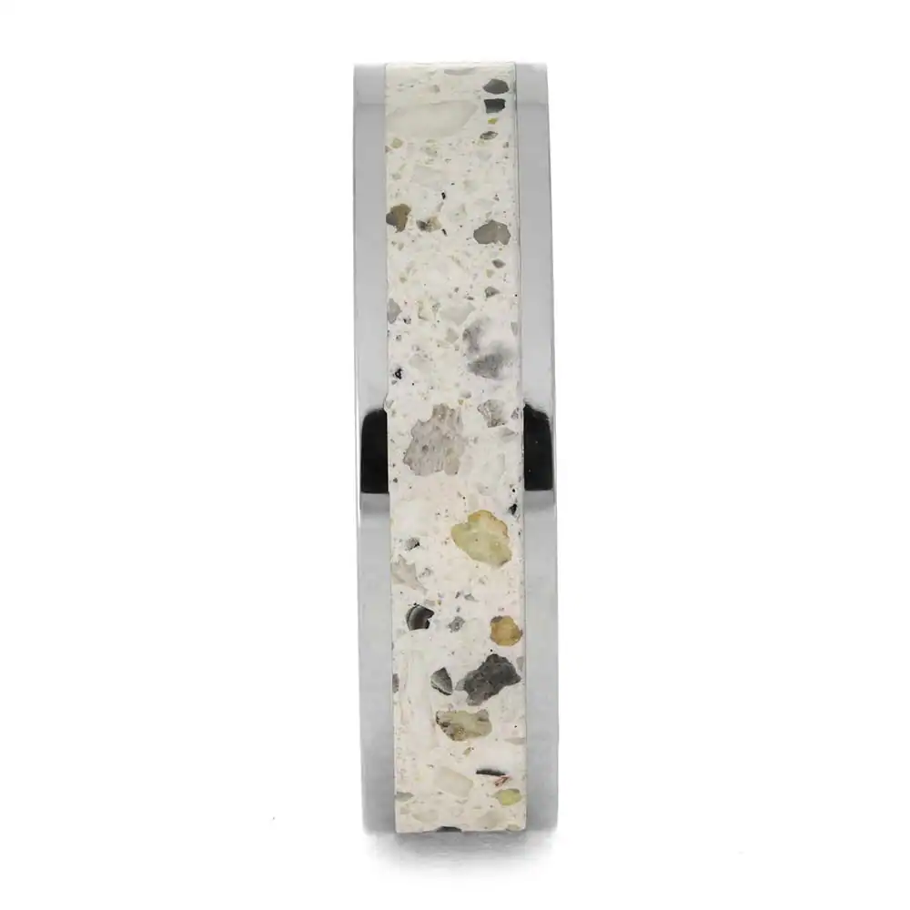 Titanium cremation ring layout with ashes and white enamel center inlay
