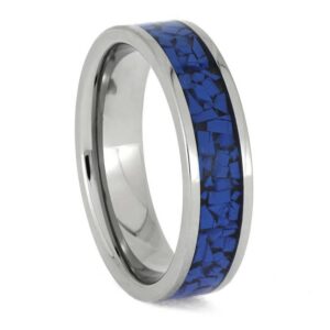 Upright angled view of titanium pet collar memorial ring with blue crushed pet collar center inlay