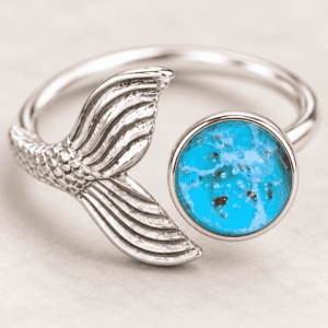 Turquoise Mermaid Tail Cremation Ring with a handcrafted glass jewel containing cremation ashes in a sterling silver setting